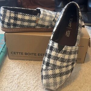 TOMS Checkered Black and White Slip-Ons